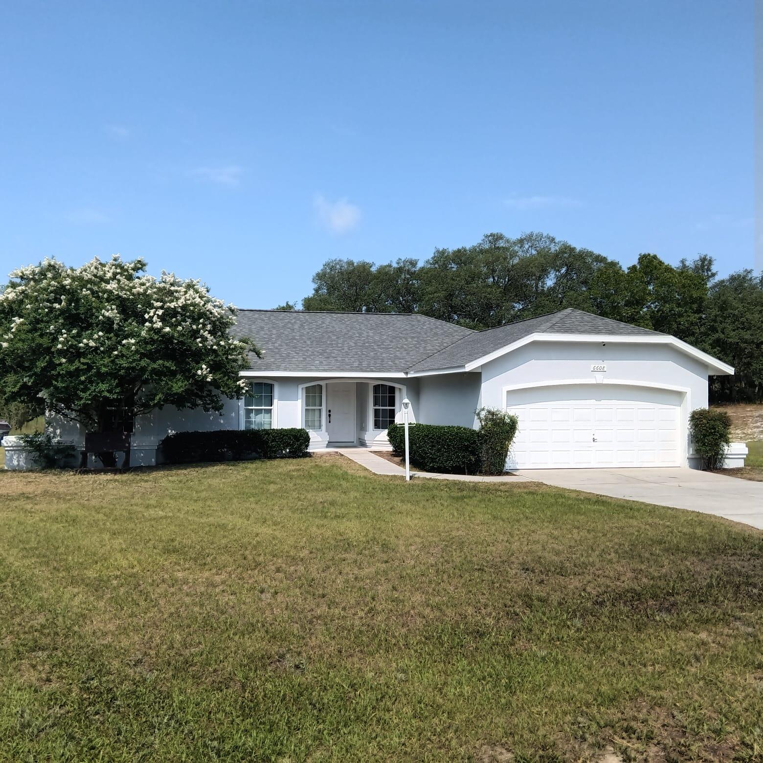 6608 Southwest 143rd Ln Road Ocala, FL 34473 - Photo 1 of 39 Front