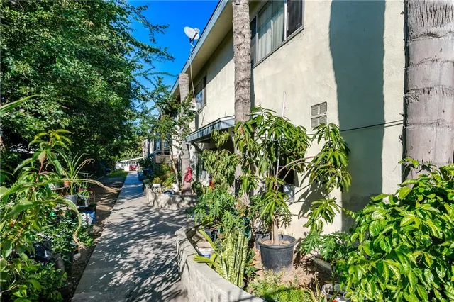 a view of a house with a street