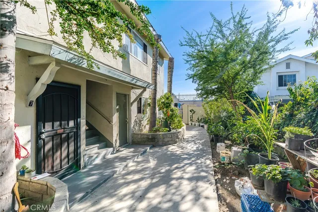 a view of a cars park in front of house