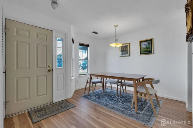 a view of a livingroom with furniture and window