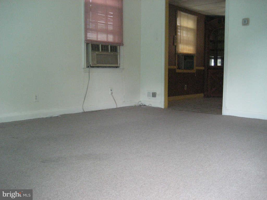7413 Marston Road Baltimore, MD 21207 - Photo 3 of 16 a view of an empty room