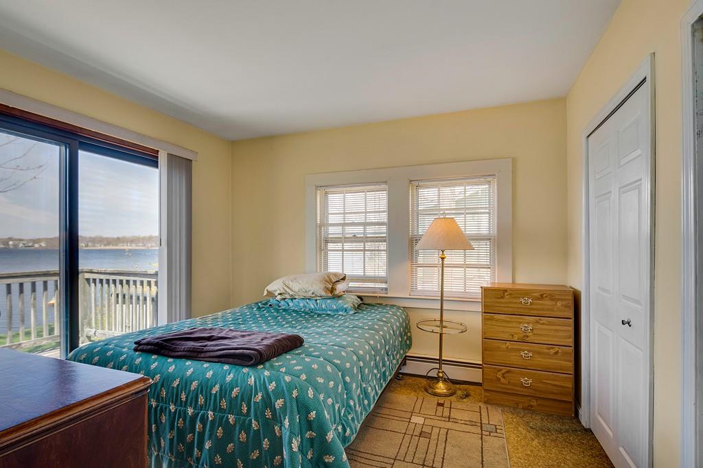 15 Greycliff Road Brighton, MA 02135 - Photo 16 of 41 a bedroom with a bed and a window