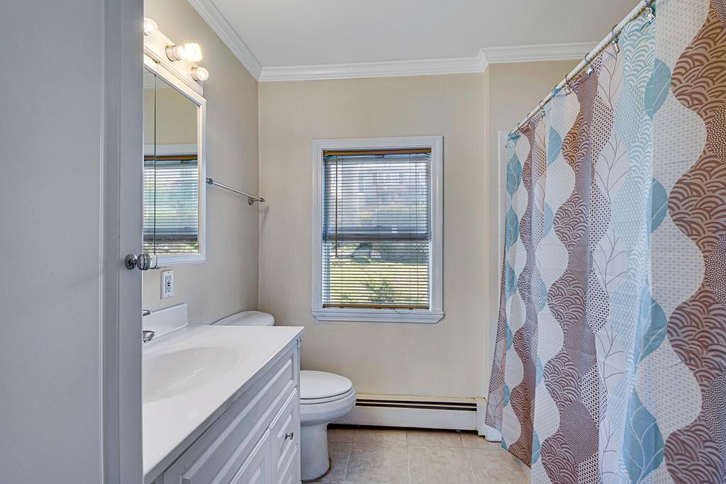15 Greycliff Road Brighton, MA 02135 - Photo 20 of 41 a bathroom with a toilet sink and shower