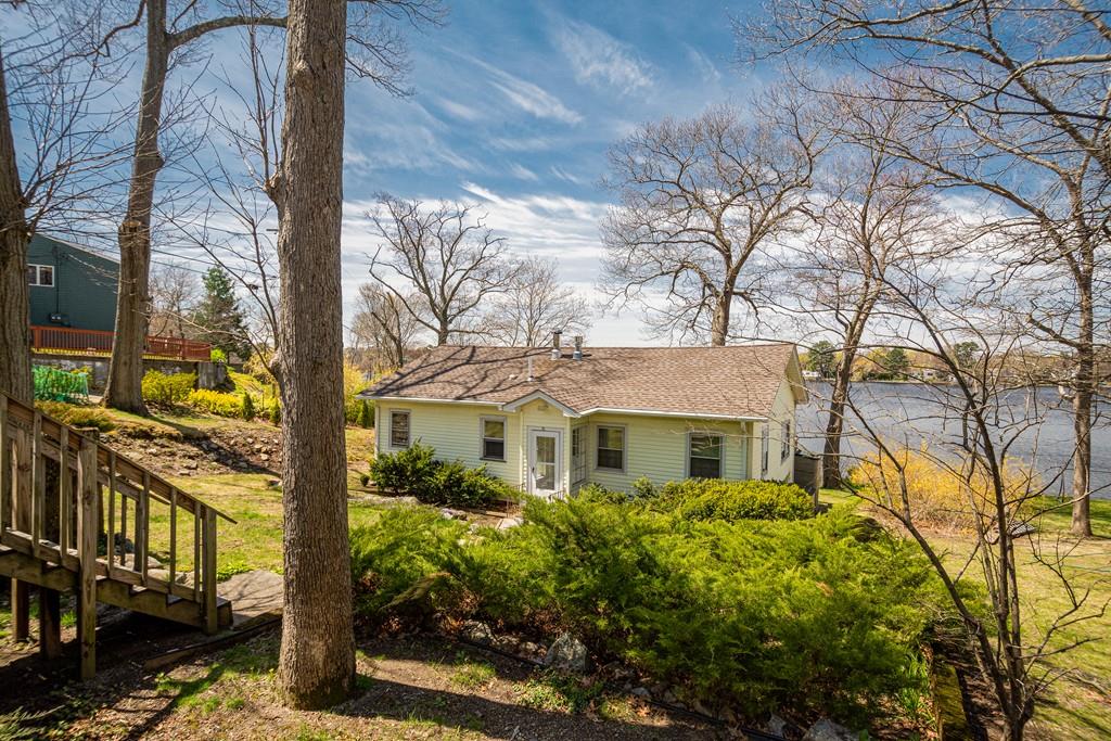 15 Greycliff Road Brighton, MA 02135 - Photo 2 of 41 a front view of a house with a yard
