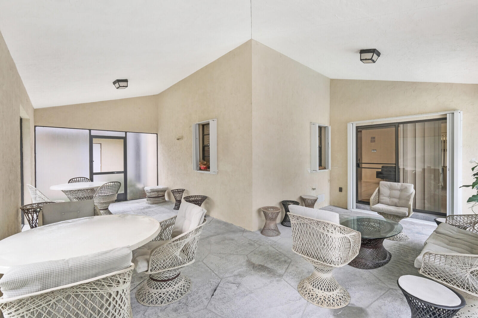 17520 Bridle Court Jupiter, FL 33478 - Photo 32 of 35 a living room with furniture and a large mirror