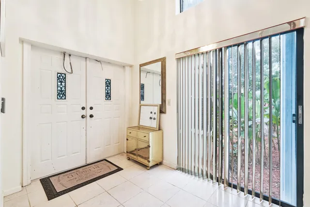 a view of a hallway with closet area