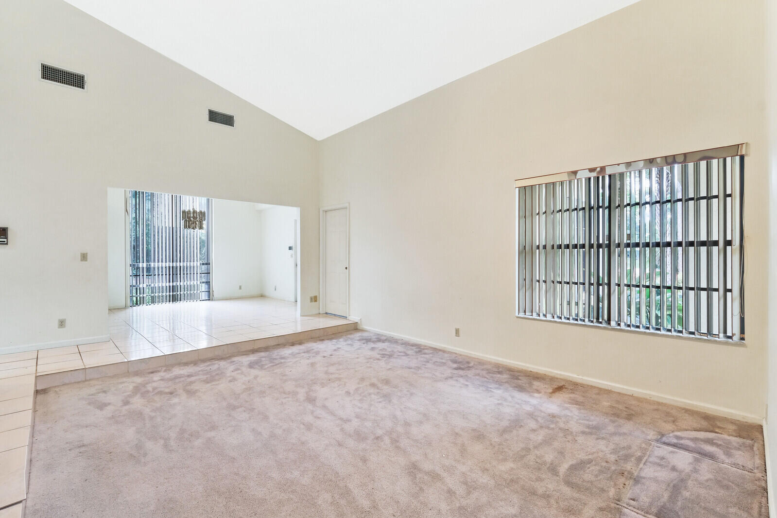 17520 Bridle Court Jupiter, FL 33478 - Photo 10 of 35 a view of an empty room with a window