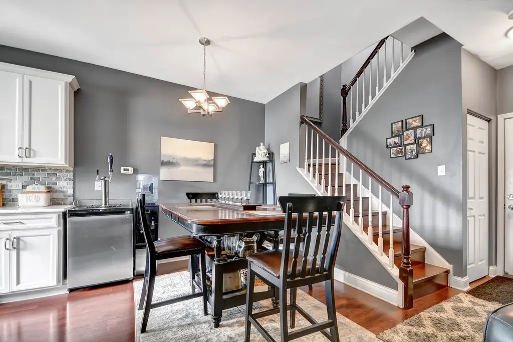 142 Azalea Circle Romeoville, IL 60446 - Photo 4 of 15 a view of a dining room with furniture window and wooden floor