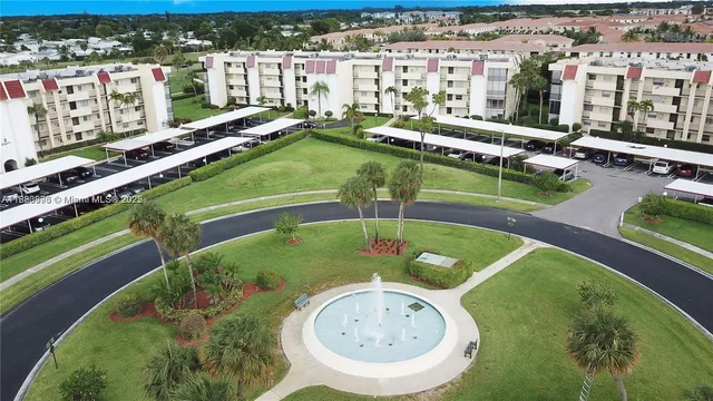 a view of a swimming pool with a garden