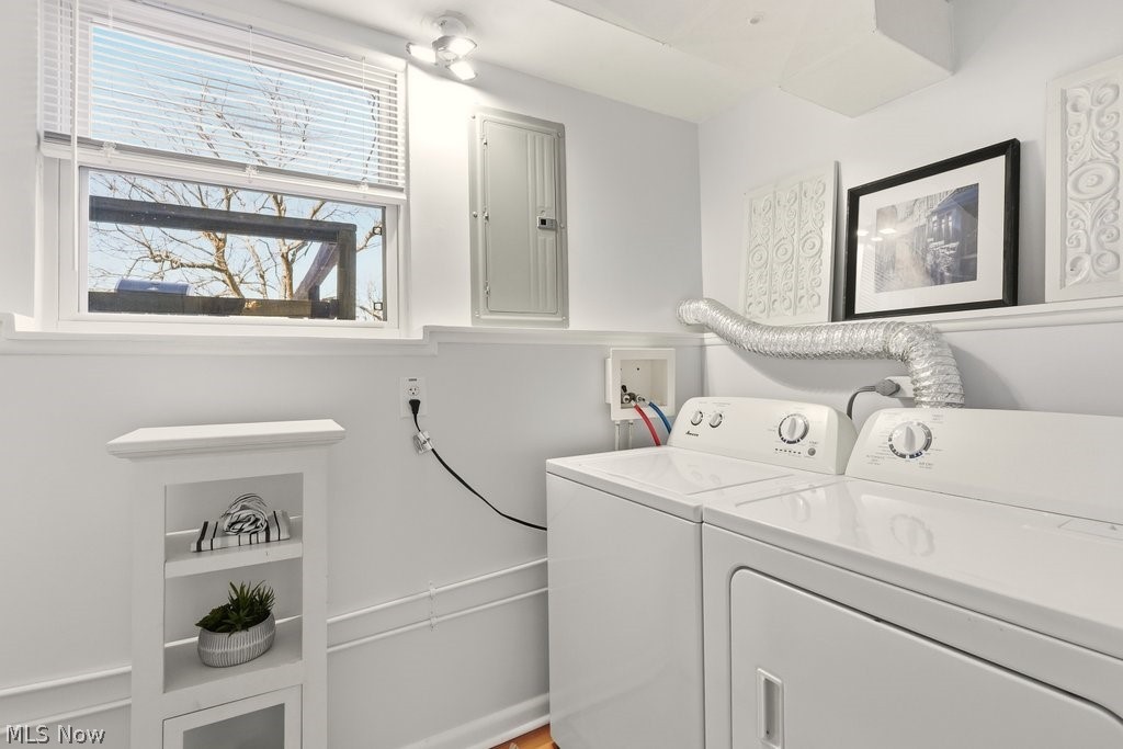 4699 West Bath Road Akron, OH 44333 - Photo 35 of 50 Laundry room with electric panel and washing machine and dryer