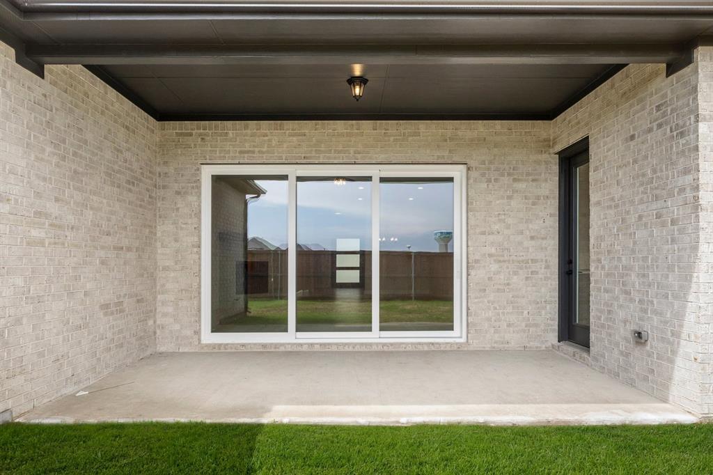 2219 Wickersham Road Rockwall, TX 75087 - Photo 24 of 37 Covered Patio - Representative Photo