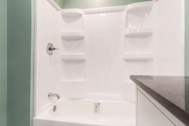 a bathroom with a bathtub