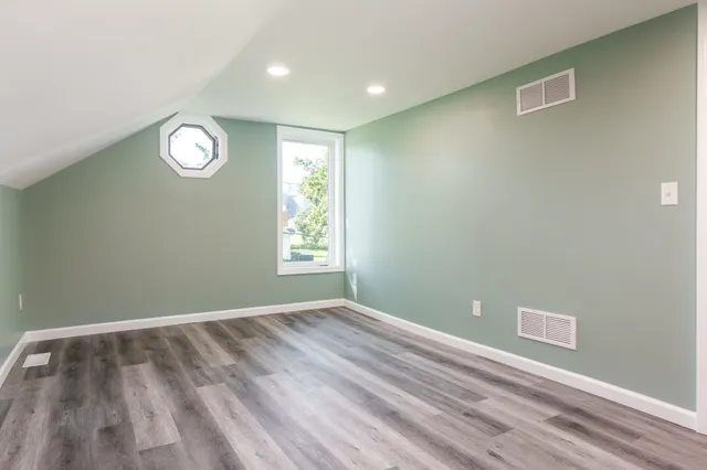 an empty room with windows