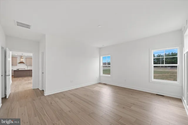 a view of livingroom with hardwood floor and a window