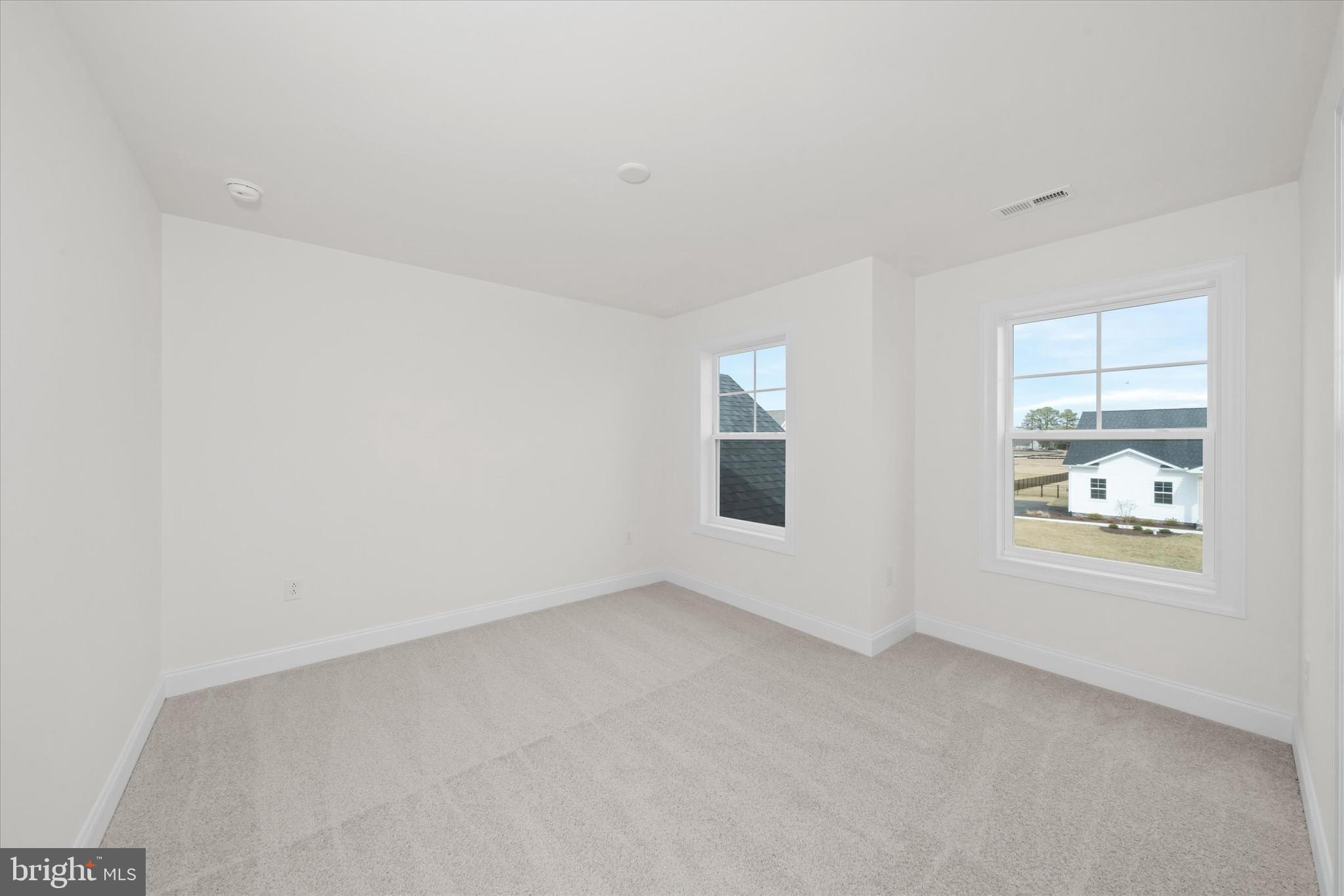 Lot#20 Hummingbird Road Ellendale, DE 19941 - Photo 32 of 41 an empty room with windows