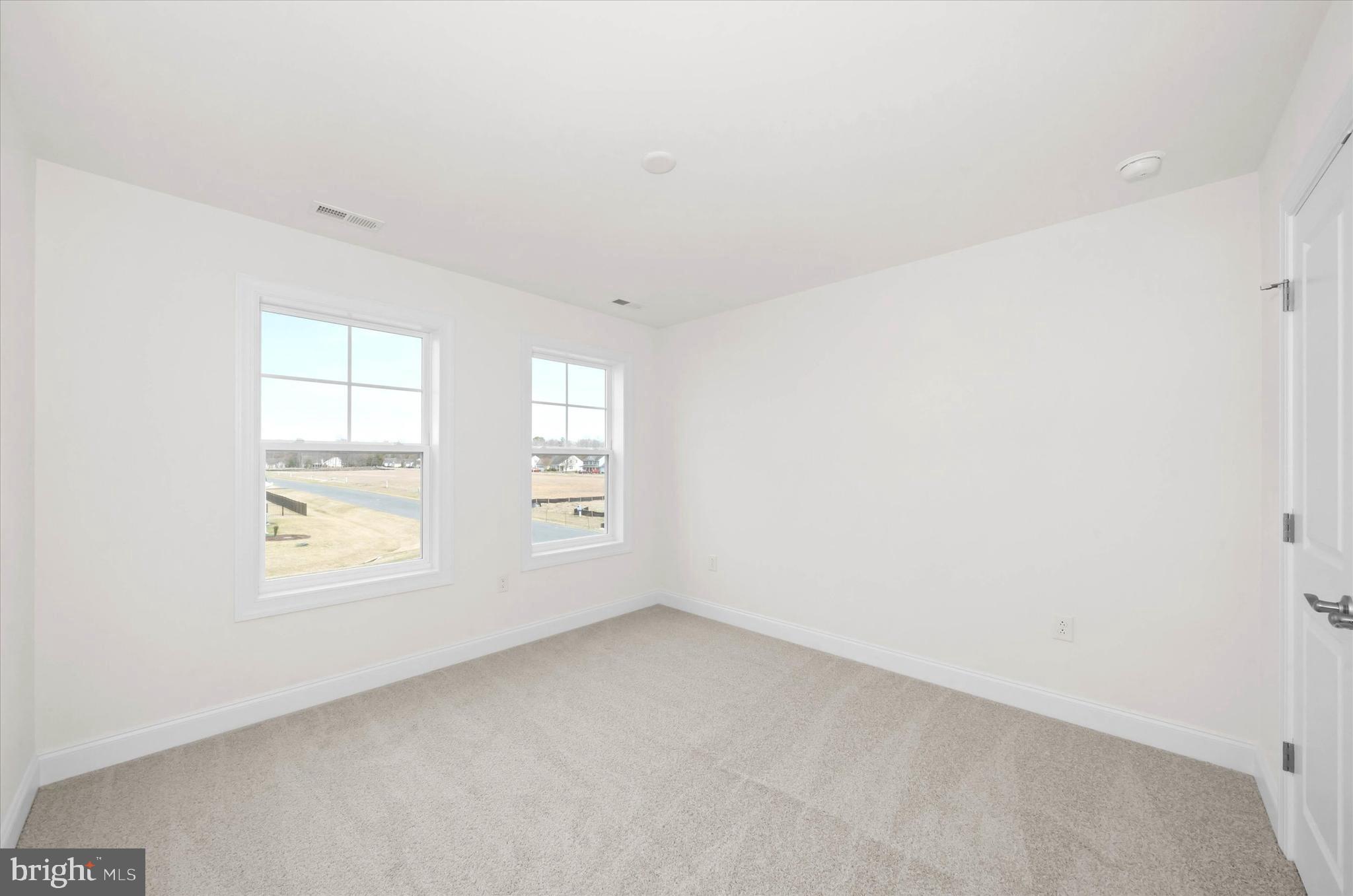 Lot#20 Hummingbird Road Ellendale, DE 19941 - Photo 34 of 41 an empty room with windows