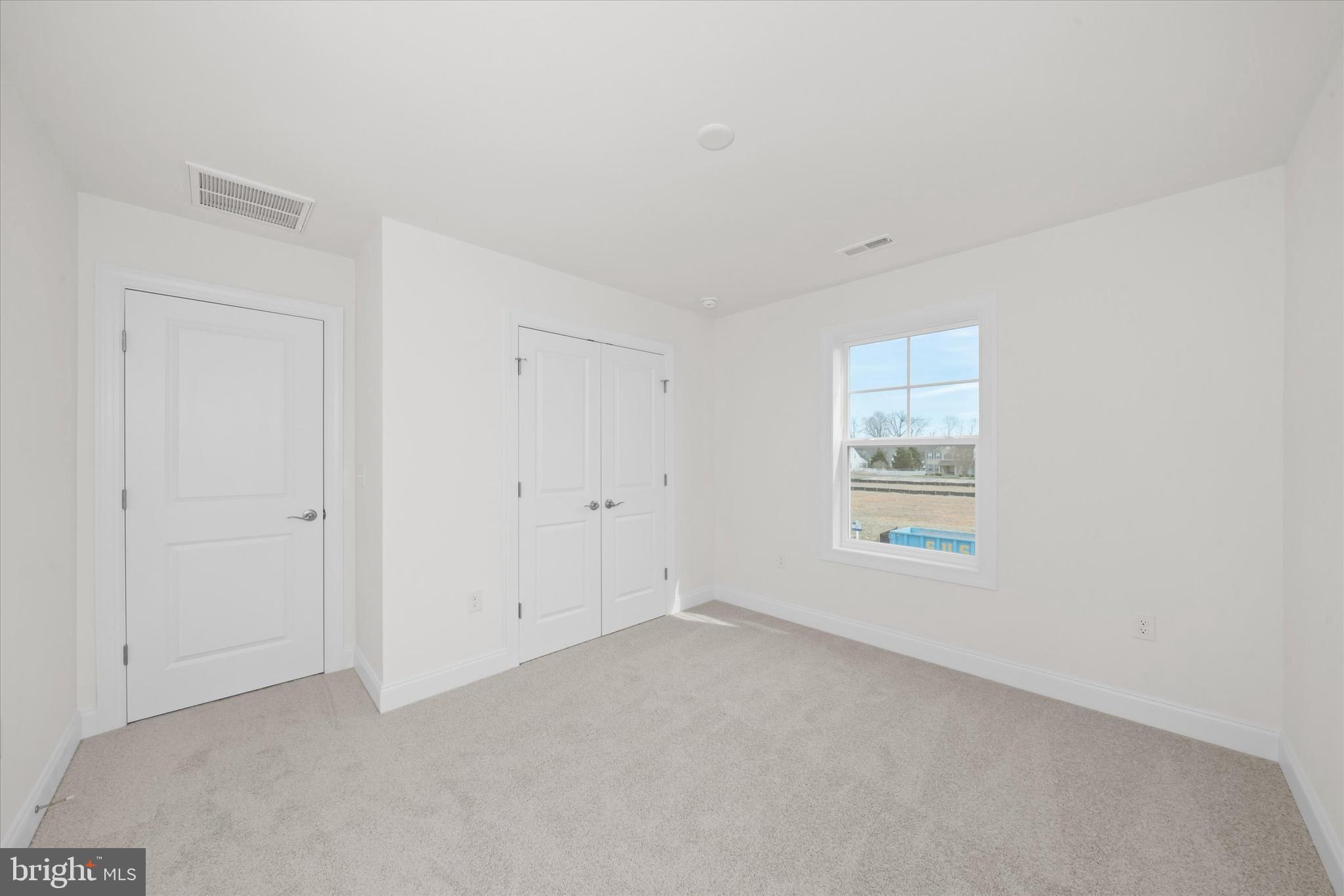 Lot#20 Hummingbird Road Ellendale, DE 19941 - Photo 38 of 41 an empty room with a window