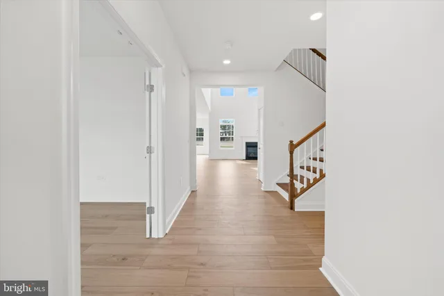 a hallway with wooden floor