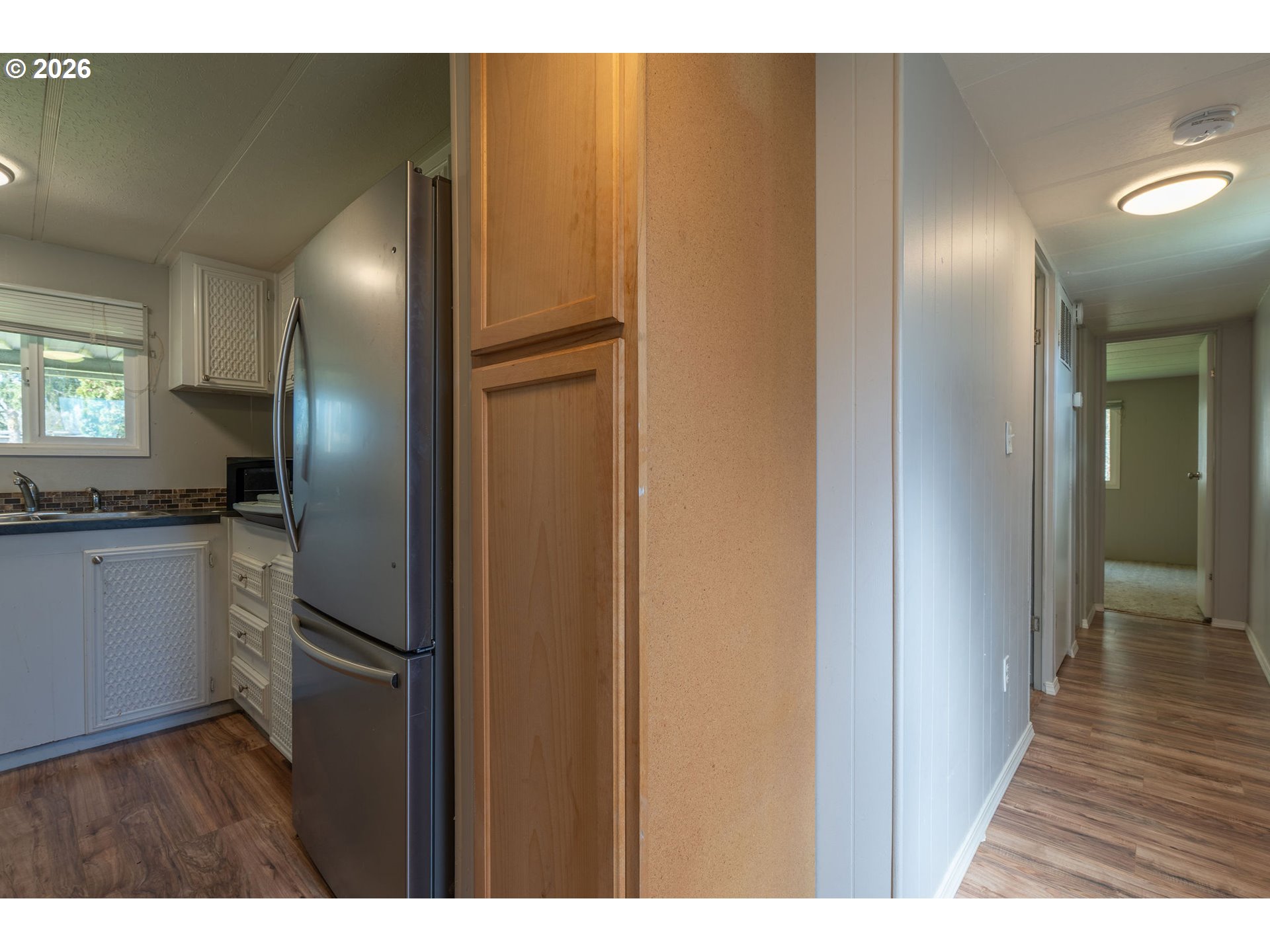 2010 Southwest 3rd Street, Unit 16 Corvallis, OR 97333 - Photo 11 of 16 a view of kitchen refrigerator and microwave