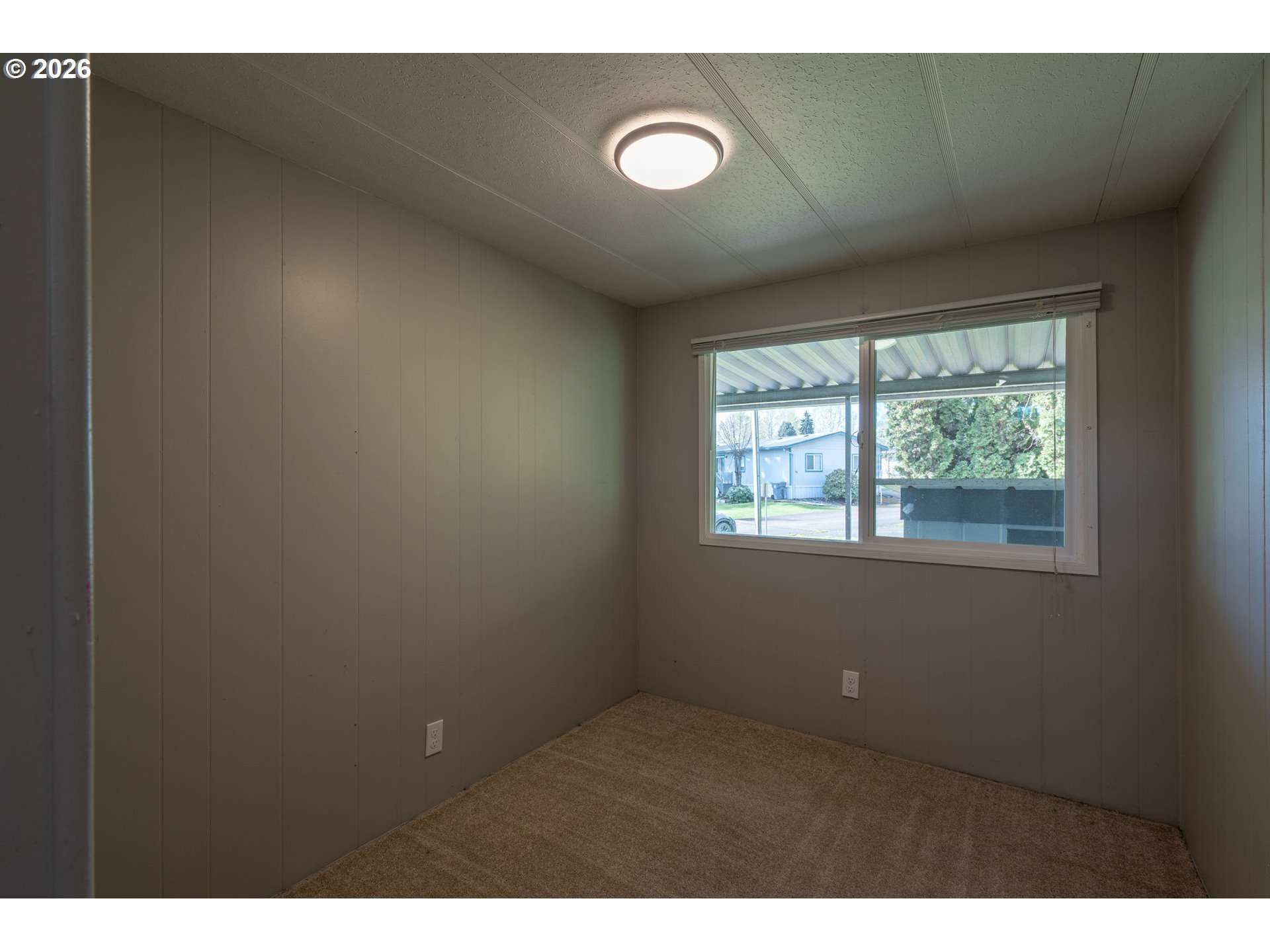 2010 Southwest 3rd Street, Unit 16 Corvallis, OR 97333 - Photo 13 of 16 a view of an empty room and window