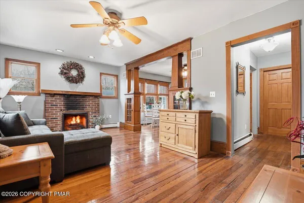 a living room with furniture and a window