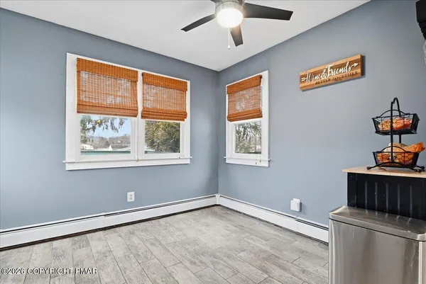 a bedroom with a bed and cabinets