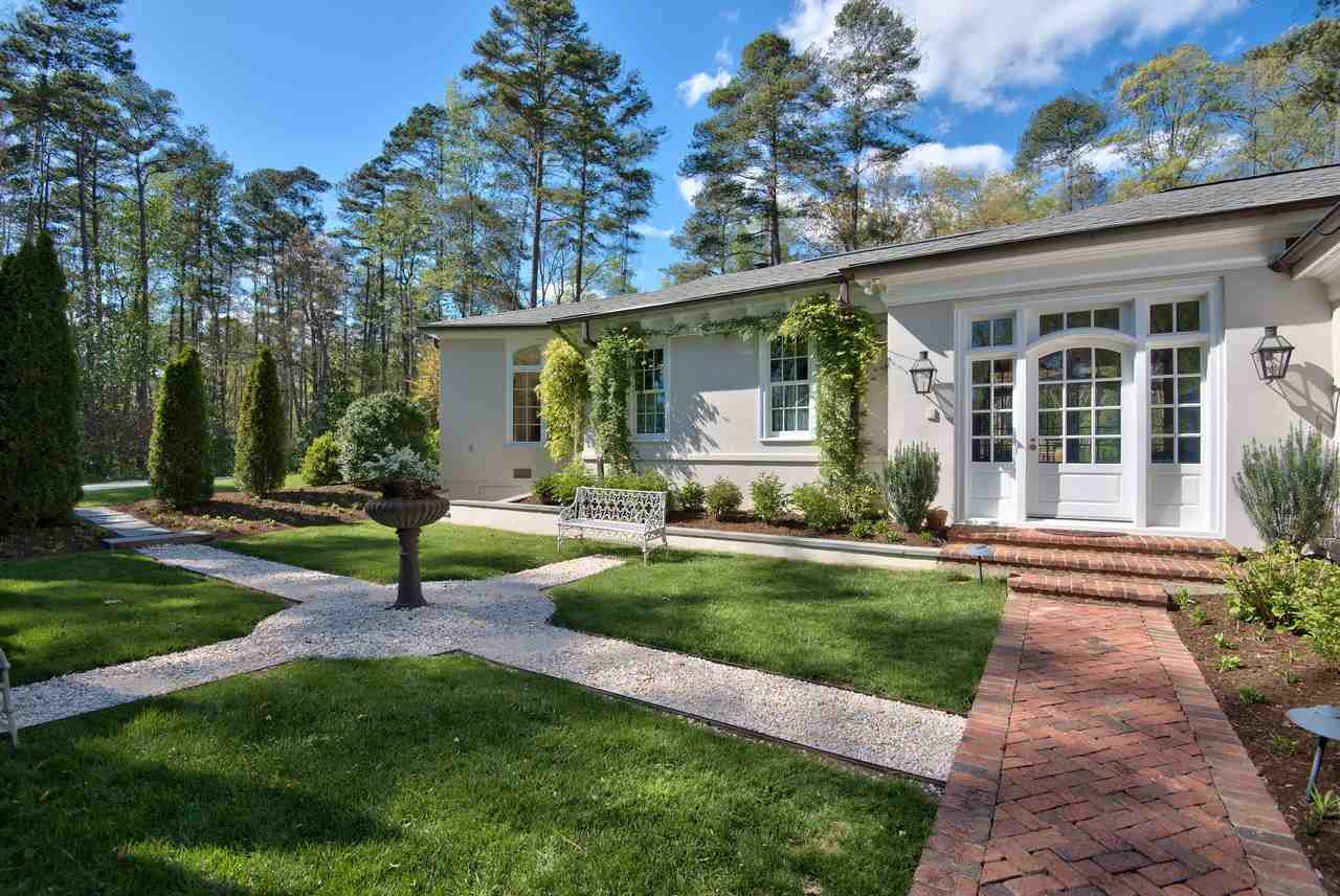 3114 Devon Road Durham, NC 27707 - Photo 15 of 25 a front view of a house with garden