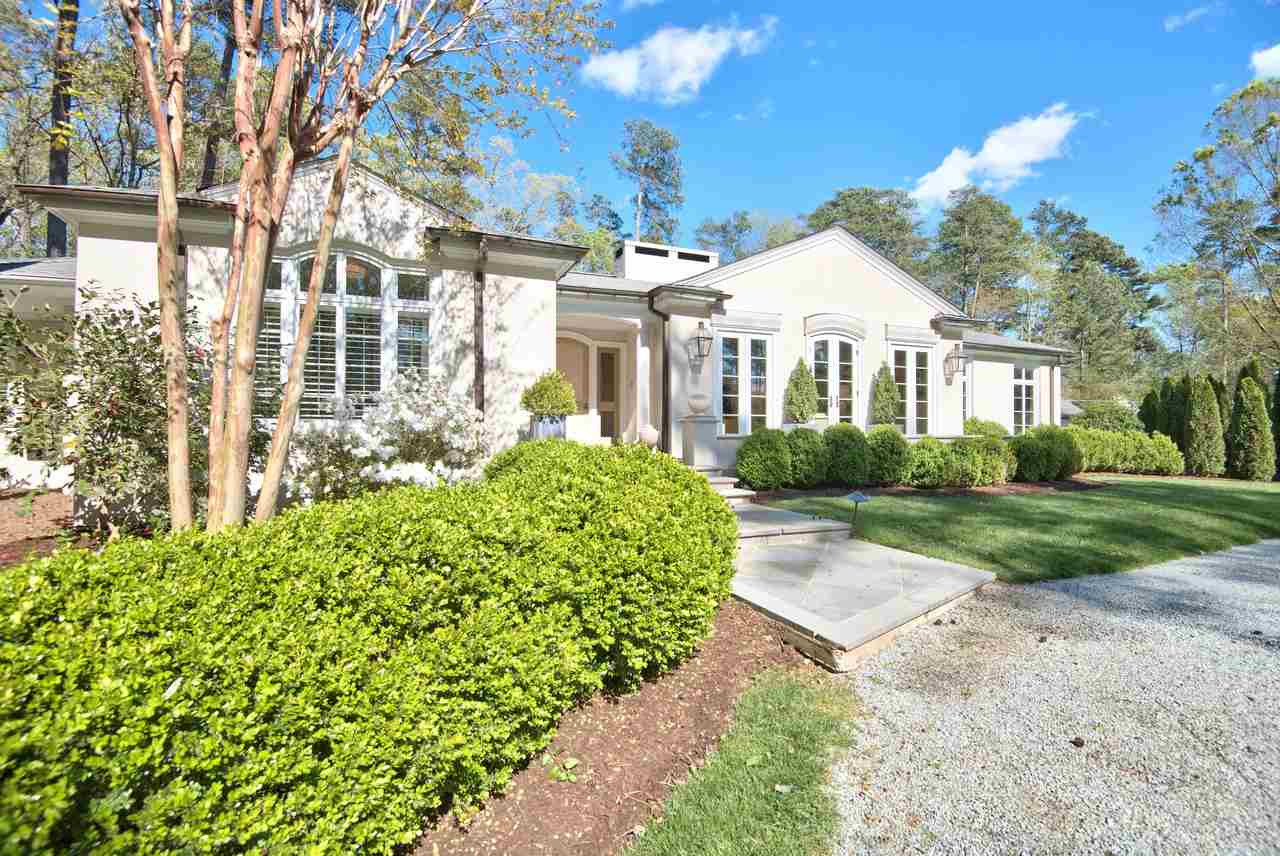 3114 Devon Road Durham, NC 27707 - Photo 2 of 25 a front view of a house with a garden