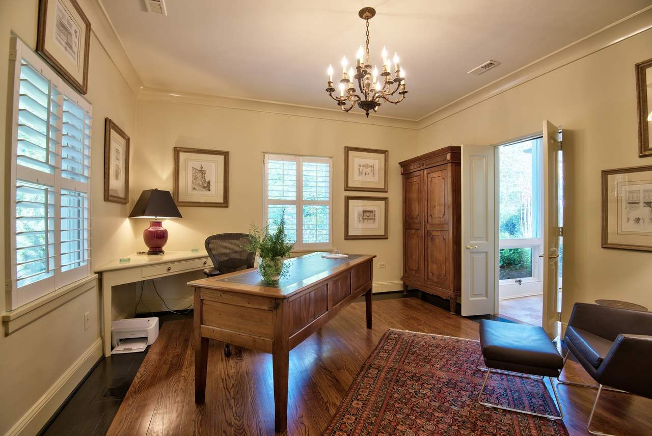 3114 Devon Road Durham, NC 27707 - Photo 6 of 25 a living room with furniture and a chandelier