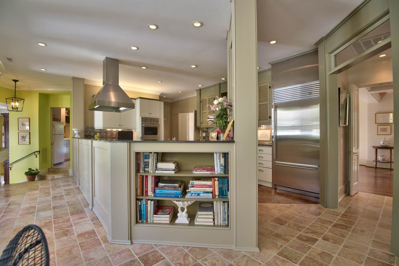 3114 Devon Road Durham, NC 27707 - Photo 10 of 25 a view of a kitchen with refrigerator and window