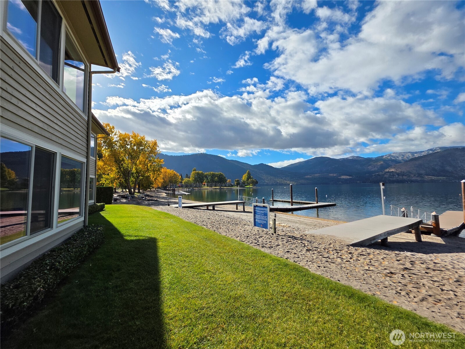 1 Lakeside 714-o Manson, WA 98831 - Photo 7 of 35 a view of a backyard with swimming pool