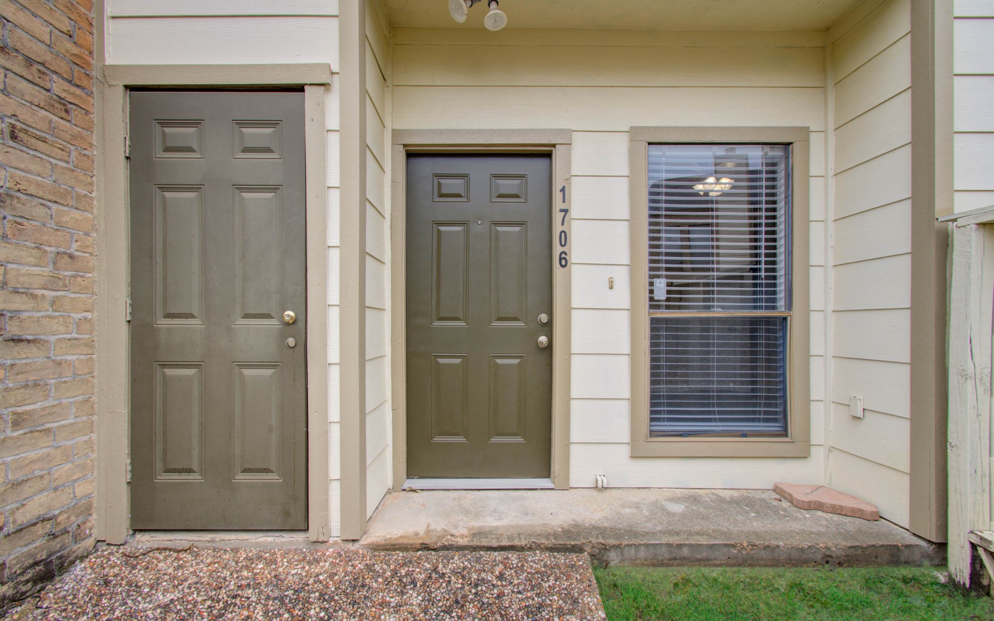 8299 Cambridge Street, Unit 1706 Houston, TX 77054 - Photo 2 of 26 front view of a wooden door
