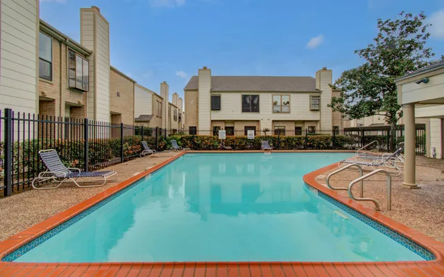 a view of a house with swimming pool