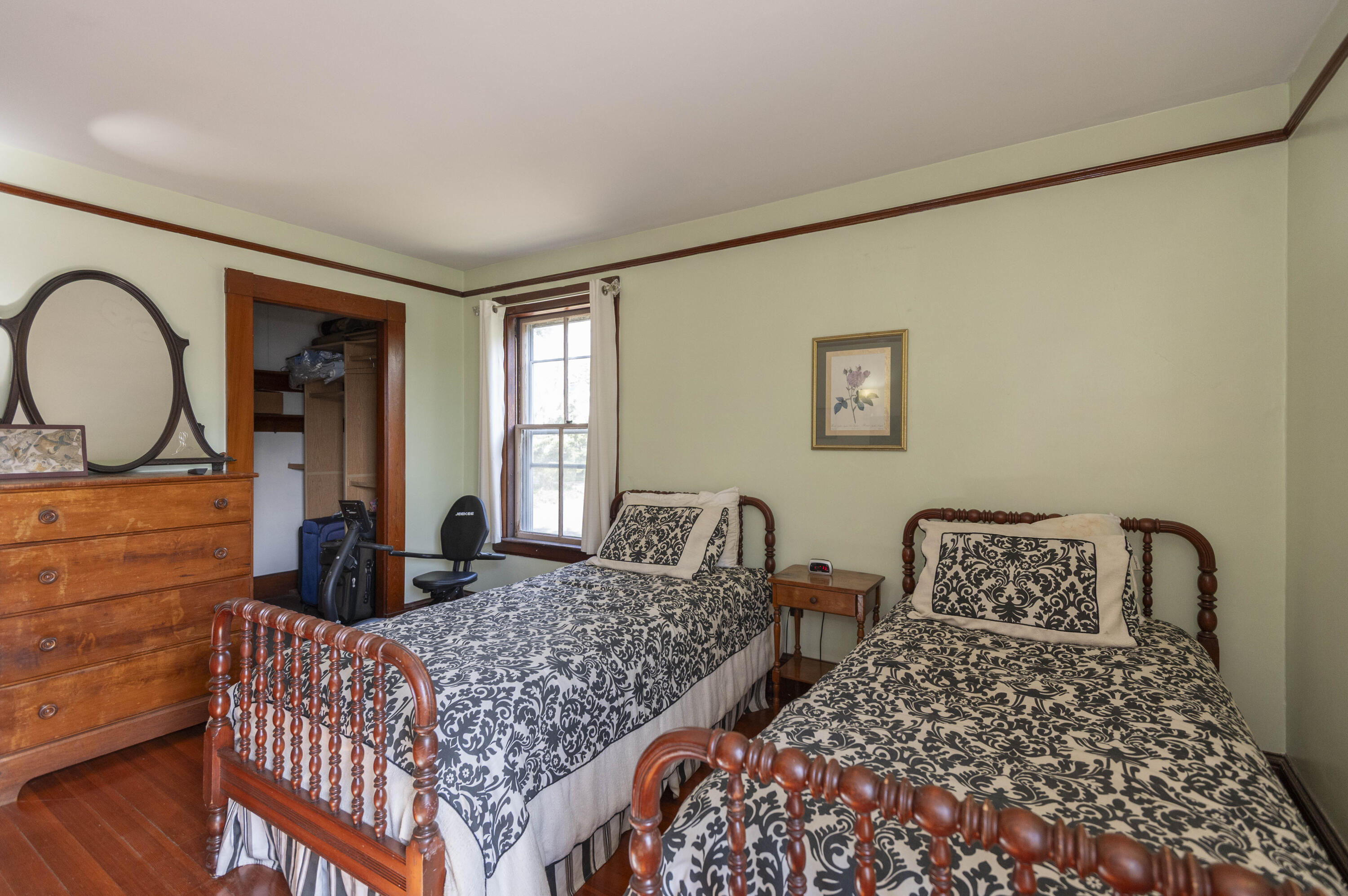 15 Bowditch Road Falmouth, MA 02543 - Photo 12 of 16 a bedroom with two beds and a dresser