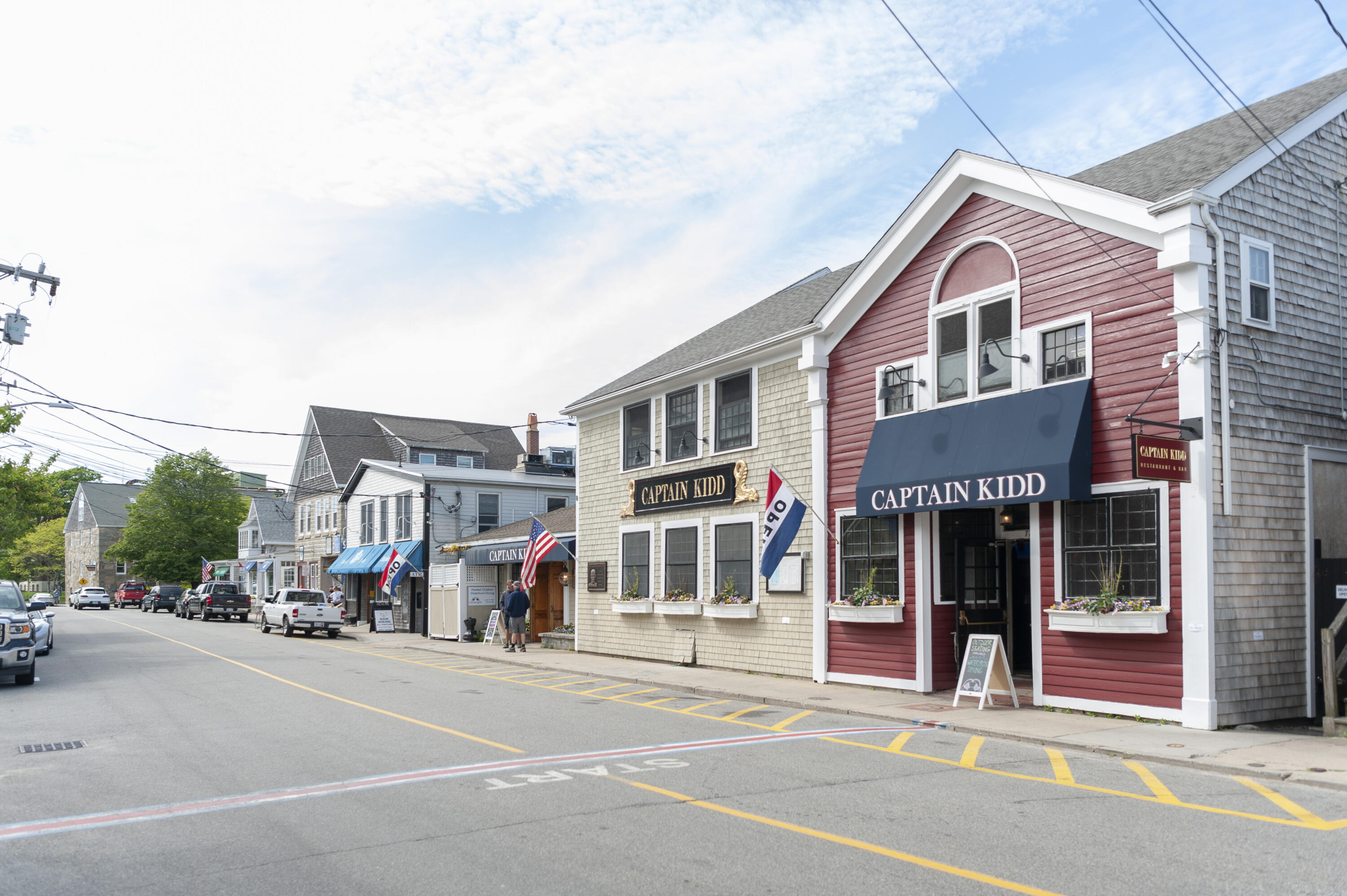 15 Bowditch Road Falmouth, MA 02543 - Photo 15 of 16 a front view of a building with street