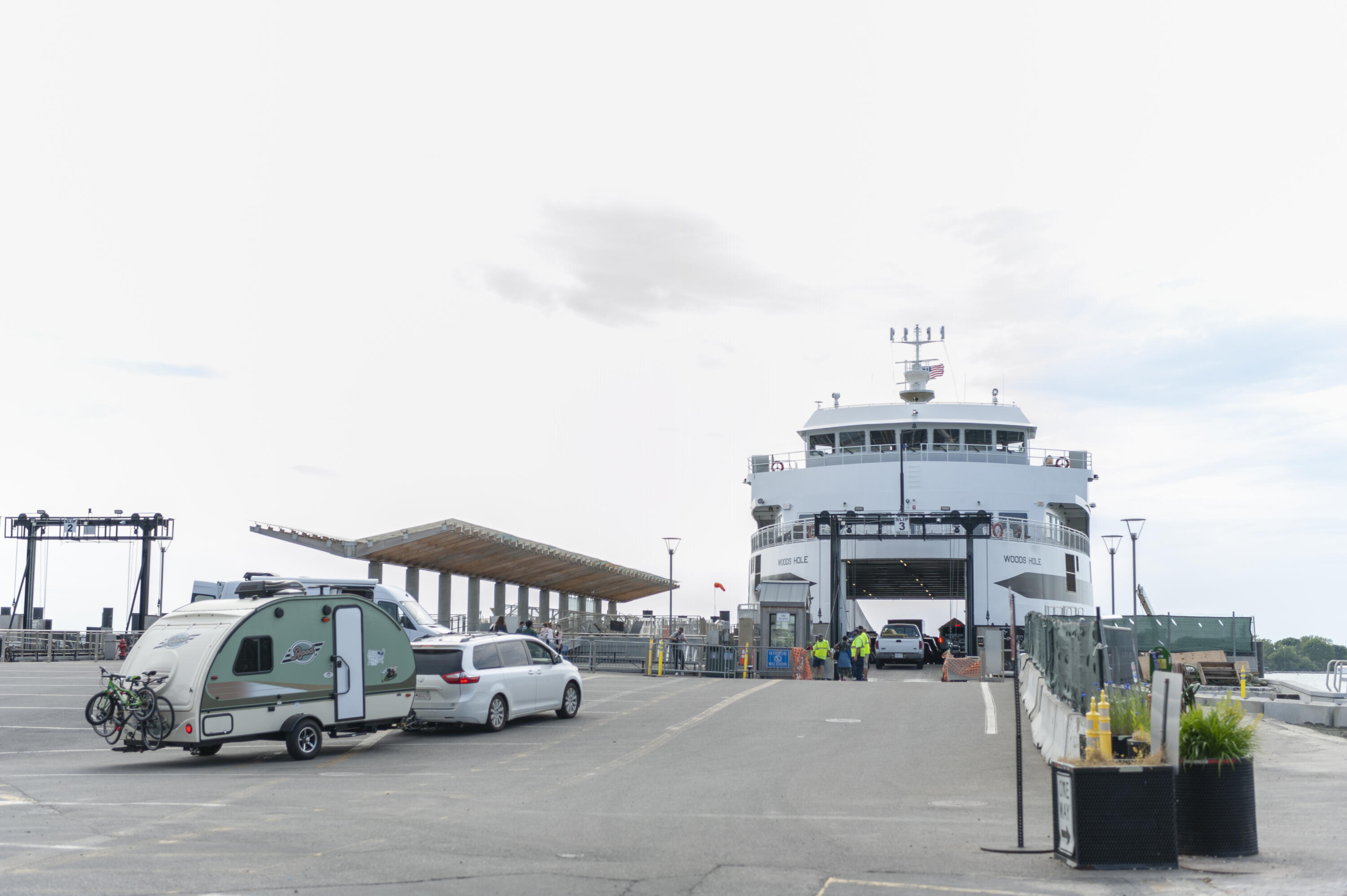 15 Bowditch Road Falmouth, MA 02543 - Photo 16 of 16 a car parked in front of a building