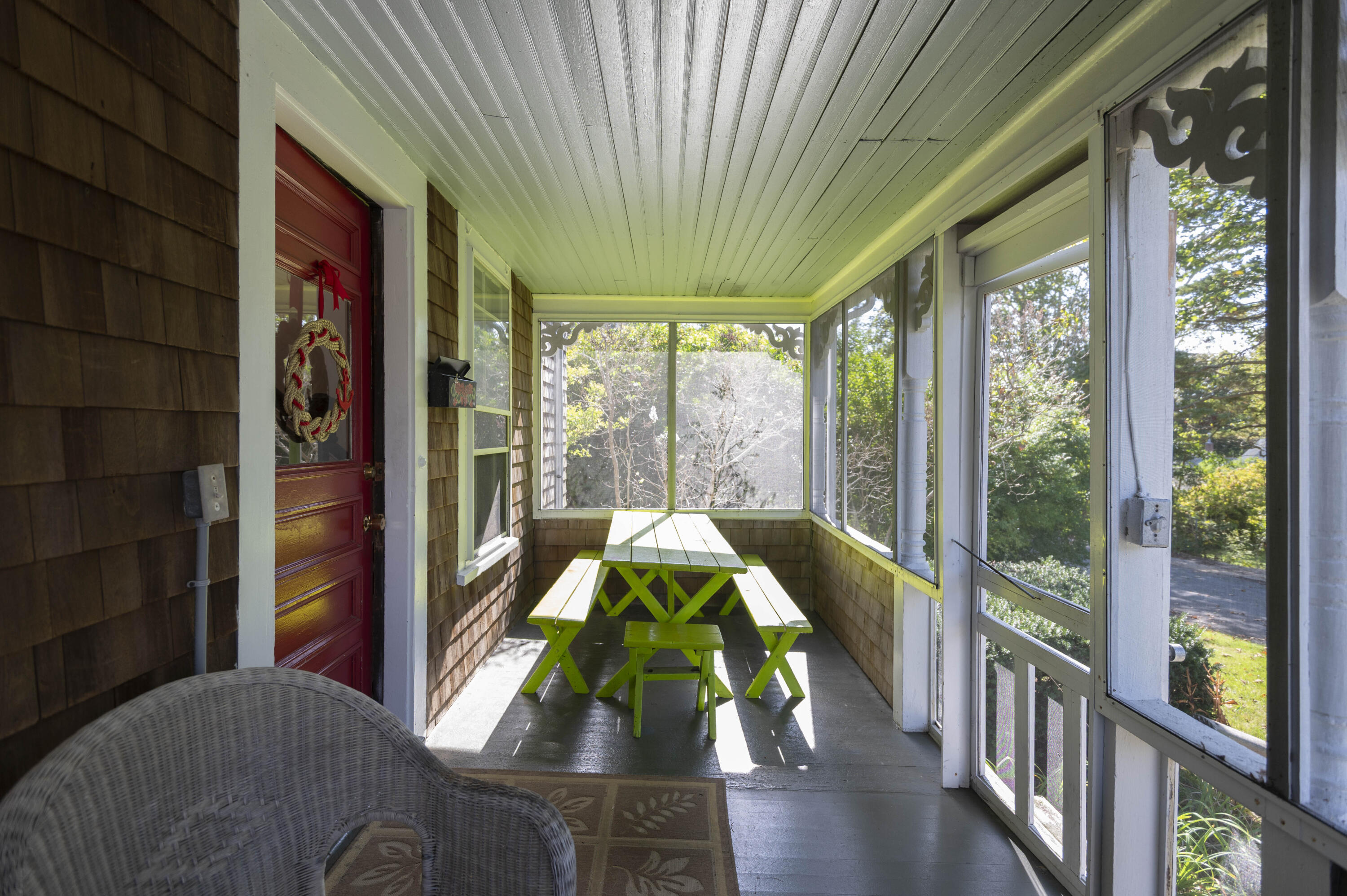 15 Bowditch Road Falmouth, MA 02543 - Photo 2 of 16 a living room filled with furniture and a large window