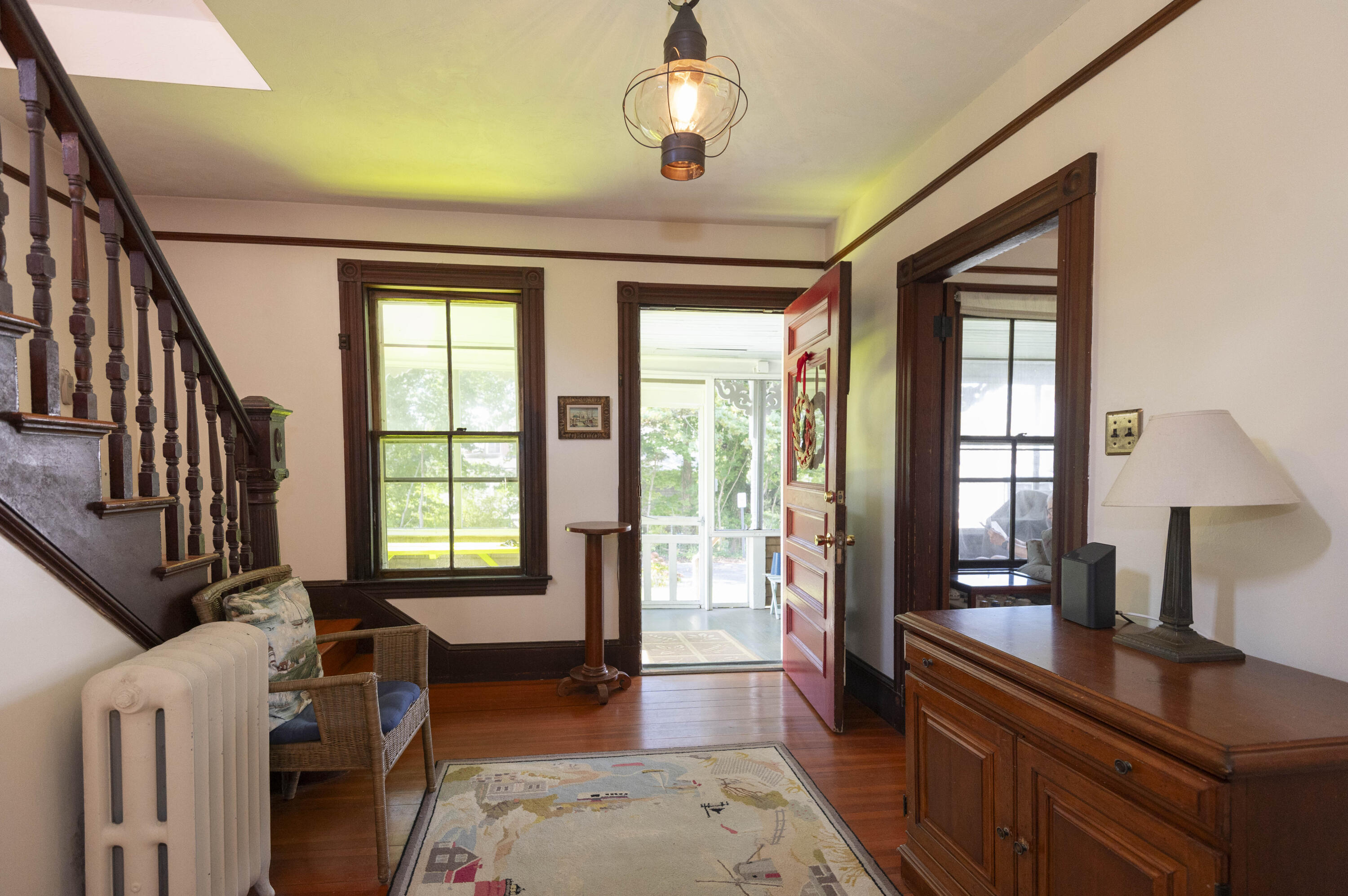 15 Bowditch Road Falmouth, MA 02543 - Photo 3 of 16 a view of a livingroom with furniture hardwood floor and a ceiling fan