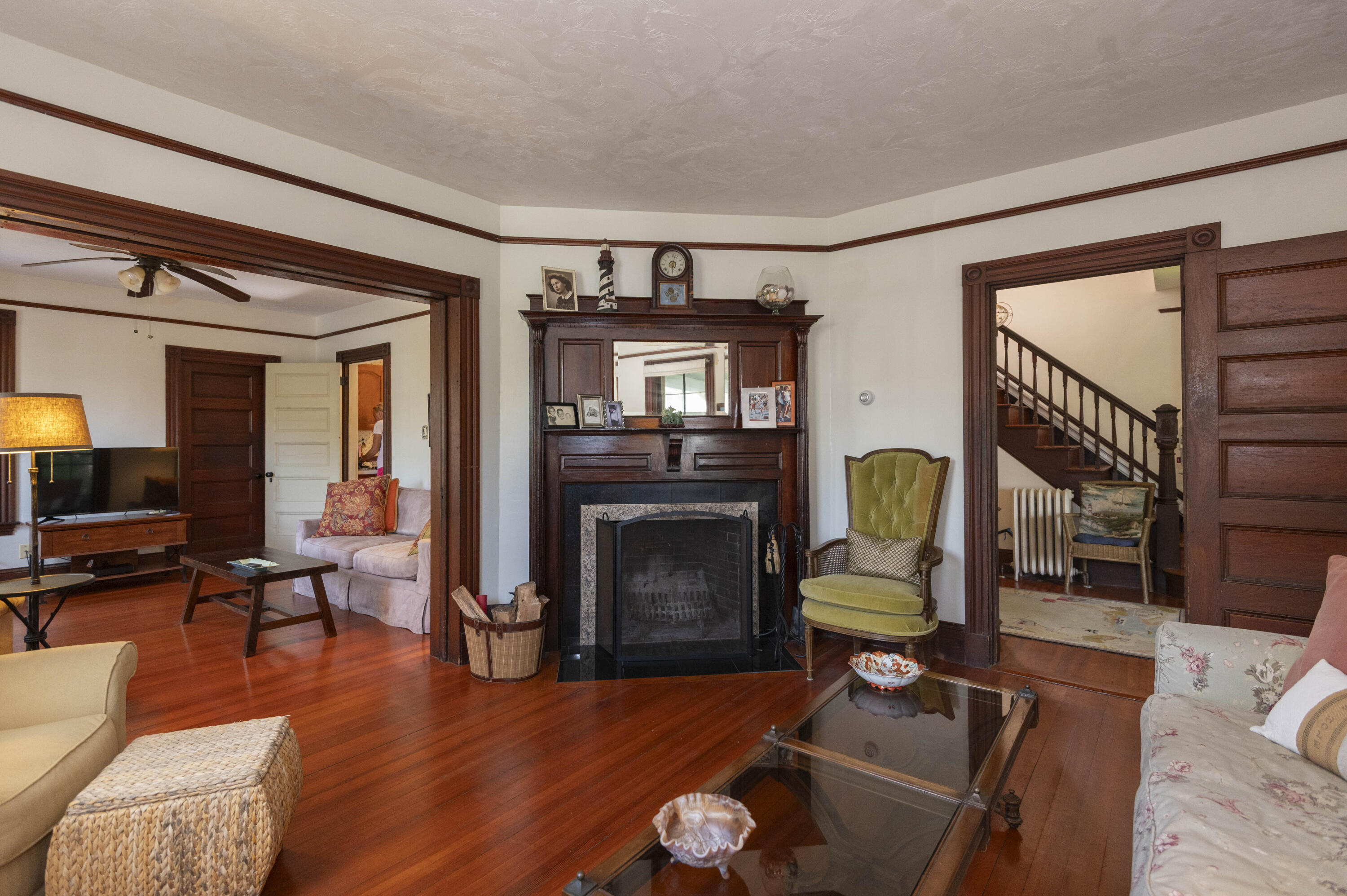 15 Bowditch Road Falmouth, MA 02543 - Photo 5 of 16 a living room with furniture and a fireplace