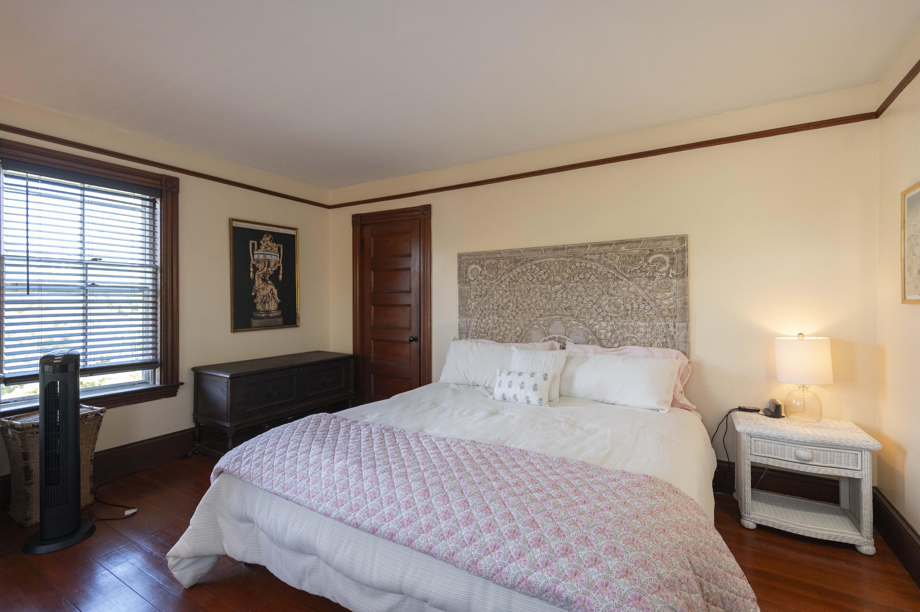 15 Bowditch Road Falmouth, MA 02543 - Photo 9 of 16 a bedroom with a large bed and a window