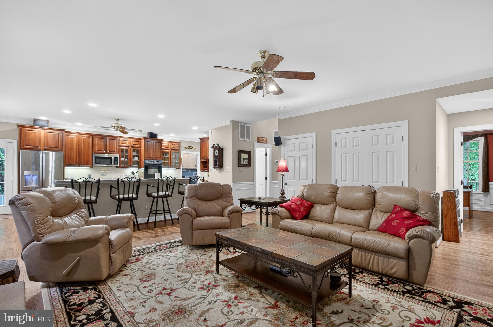 6601 Colchester Road Fairfax Station, VA 22039 - Photo 15 of 78 a living room with furniture kitchen view and a window