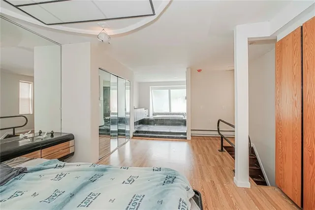 a large spacious bathroom with a large tub and sink