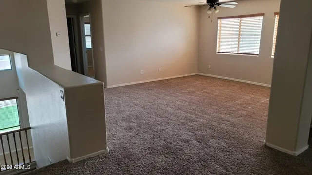 a view of a room that has a window in it