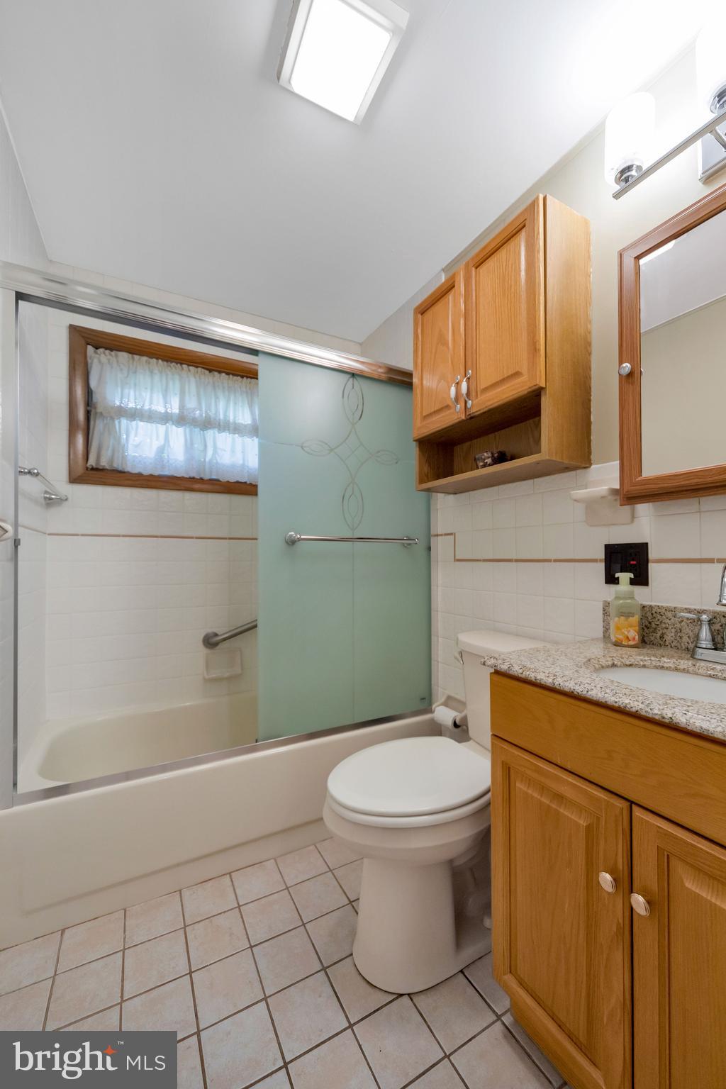 2181 Springhouse Lane Aston, PA 19014 - Photo 15 of 37 Ceramic tile floor and tub surround