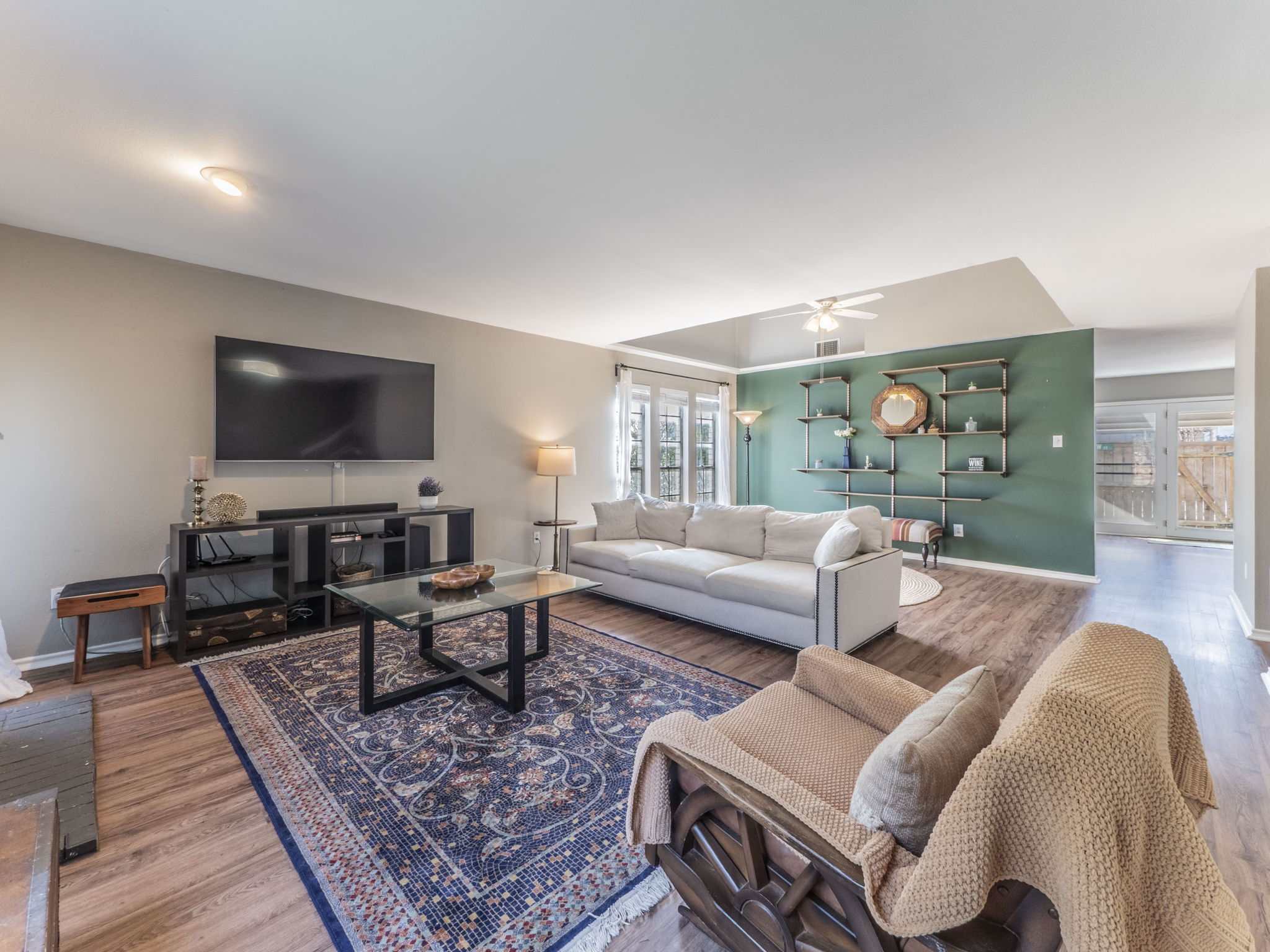 Welcome to 2110 Morley! Upon entering this light-filled condo you are greeted with a spacious living room featuring a fireplace and ample sitting/lounging room.  There is an additional offset area of the living room with vaulted ceilings and a skylight.