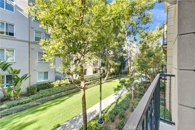 a view of a balcony with wooden floor