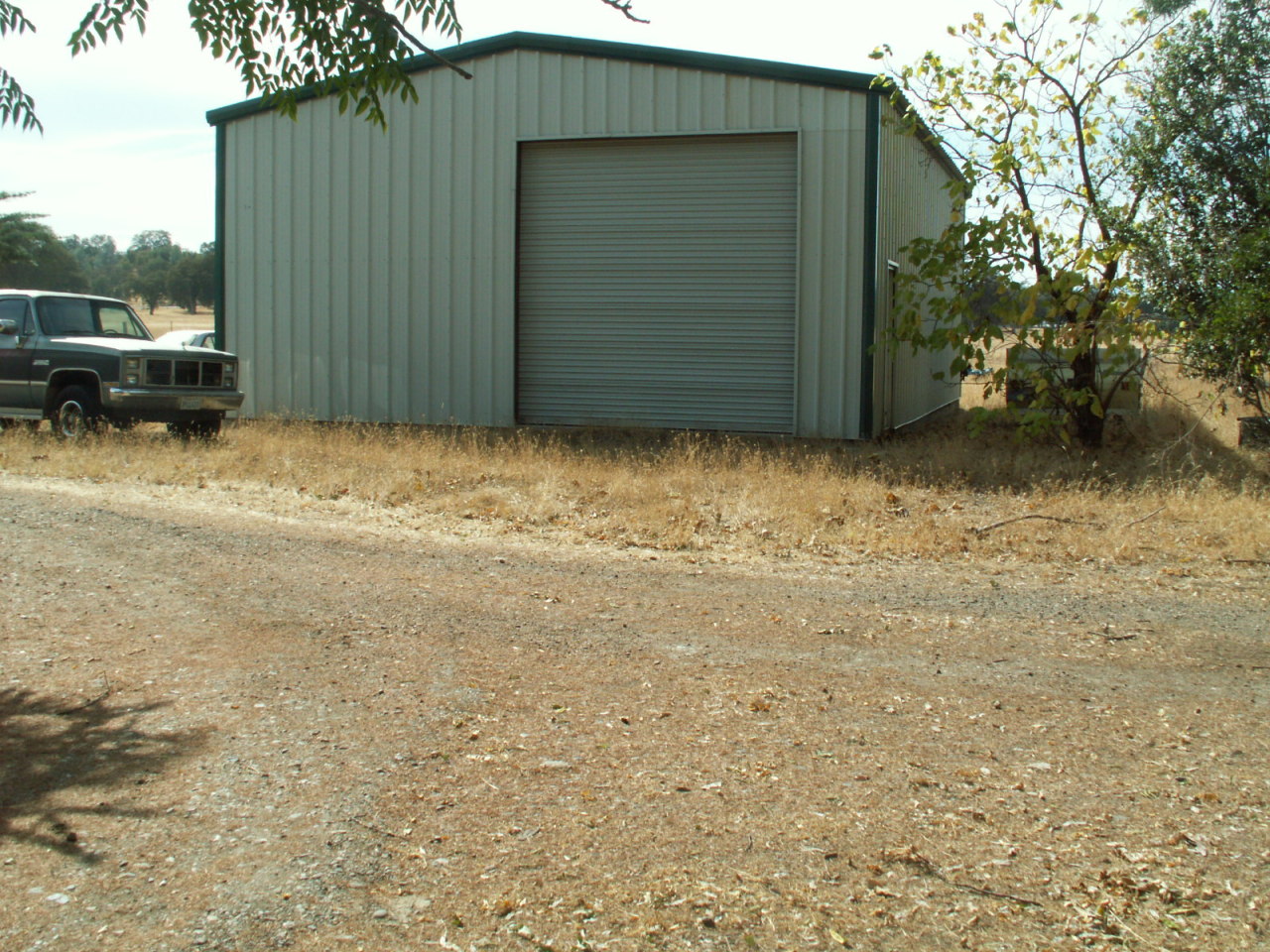 17720 Bowman Road Cottonwood, CA 96022 - Photo 4 of 13 a backyard of a house