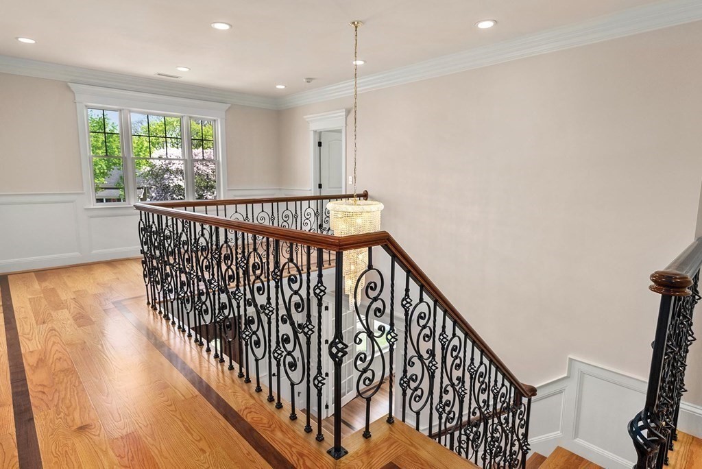 53 Van Roosen Road Newton, MA 02459 - Photo 17 of 34 a view of entryway with stairs and wooden floor