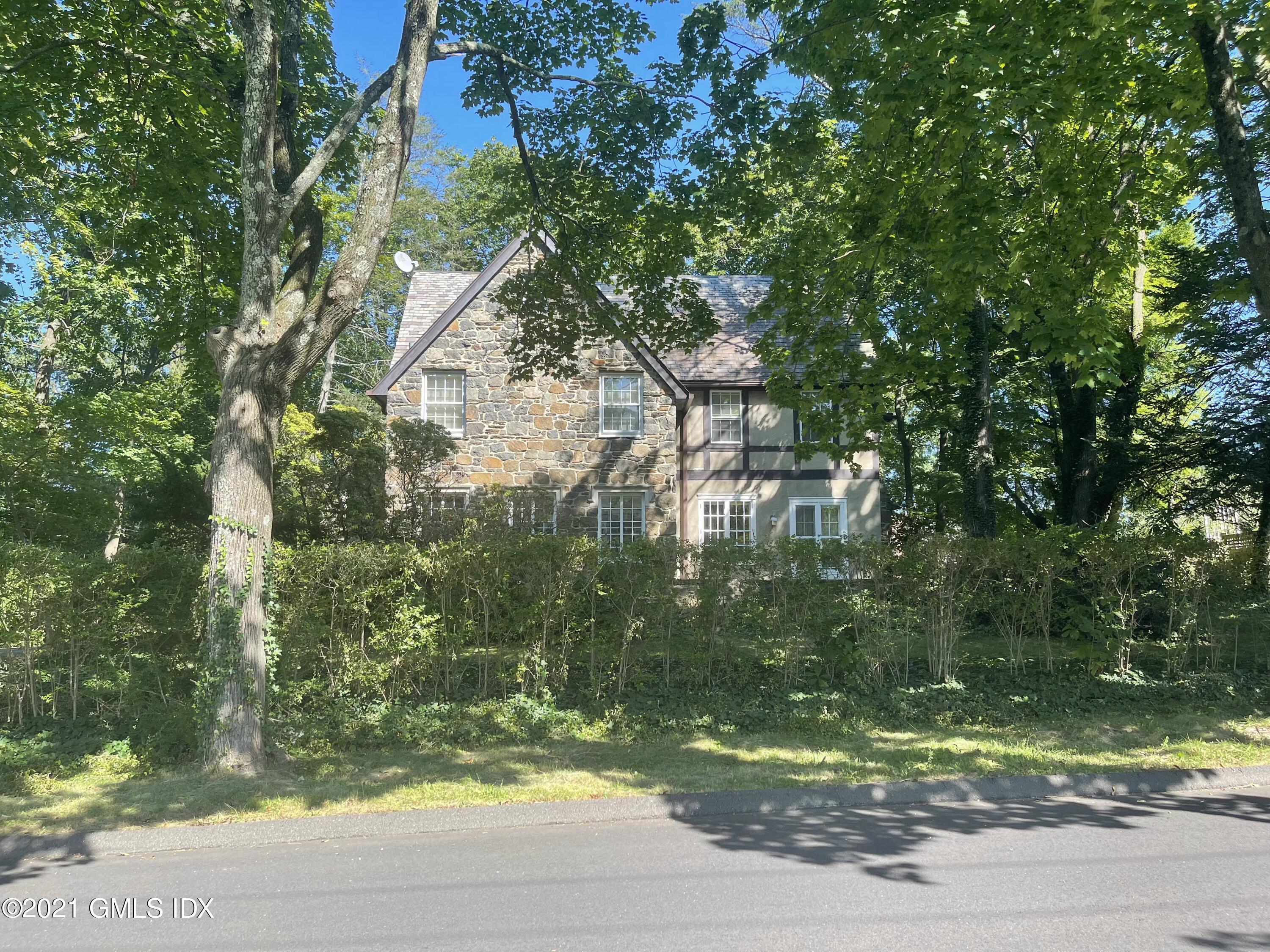 39 Old Church Road Greenwich, CT 06830 - Photo 3 of 4 a view of a yard in a house