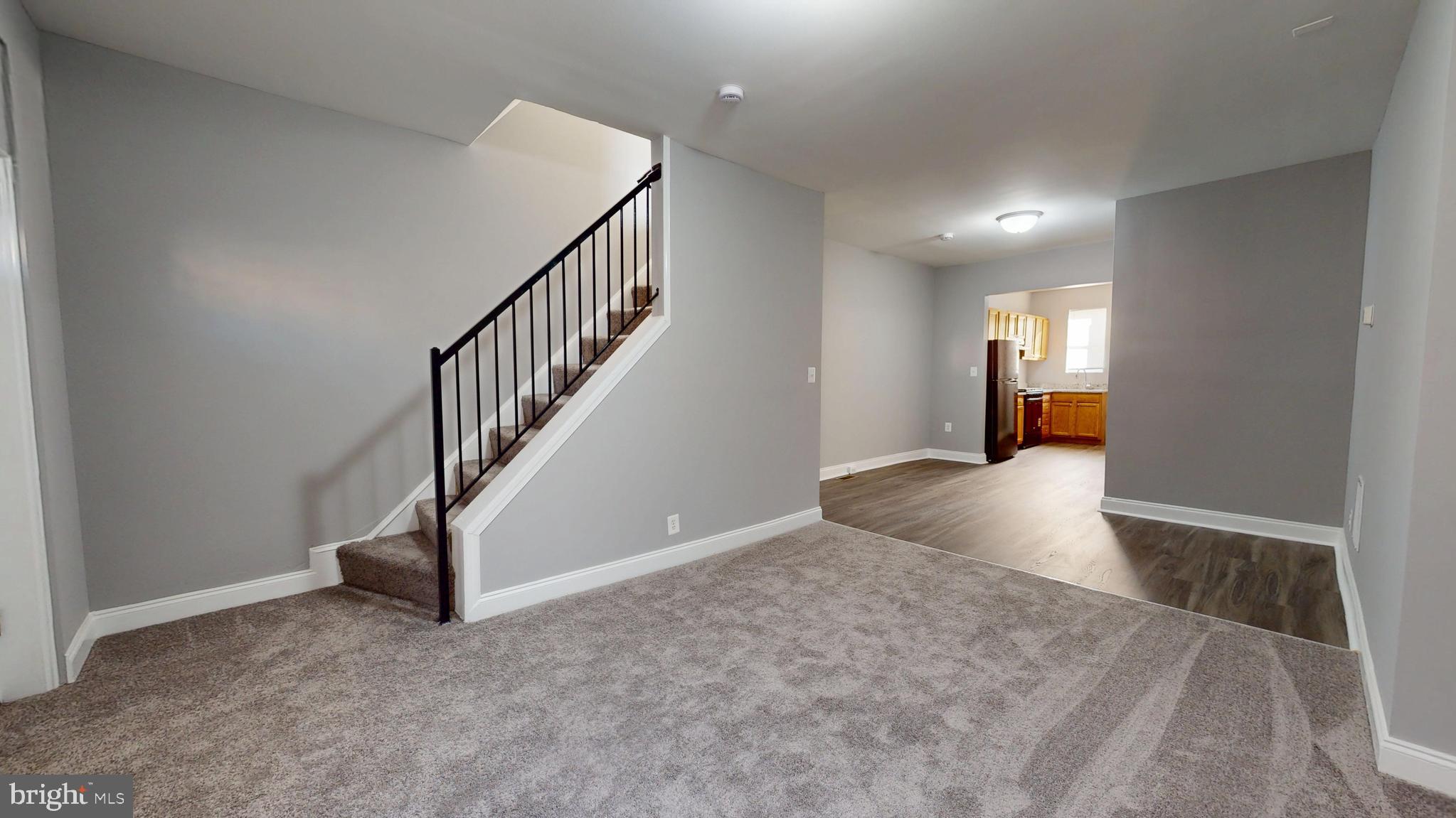 2615 East Chase Street Baltimore, MD 21213 - Photo 3 of 17 a view of a hallway view with staircase